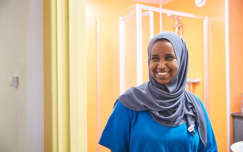 Housekeeping Assistant smiling