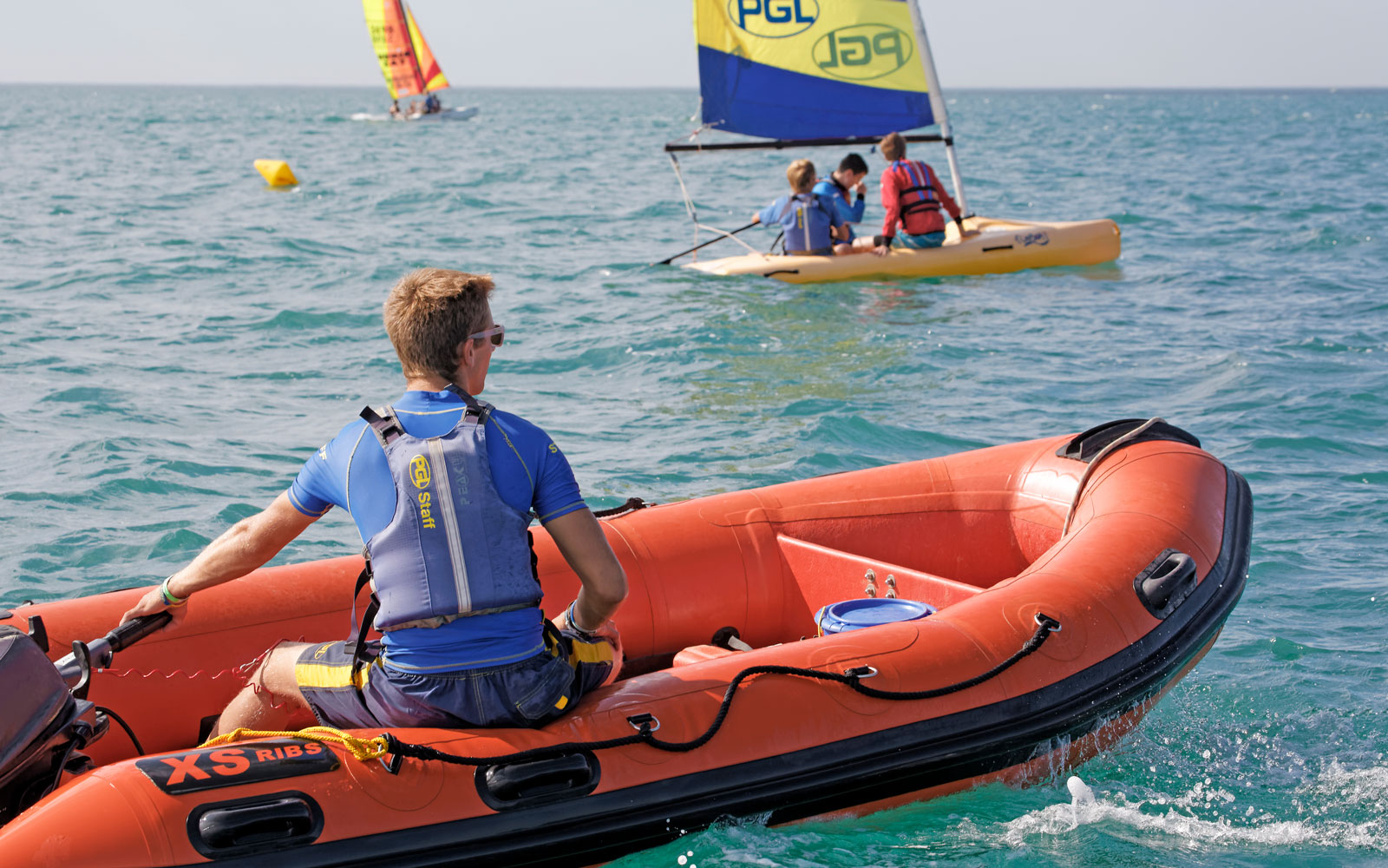 Safety Boat driven by an Instructor