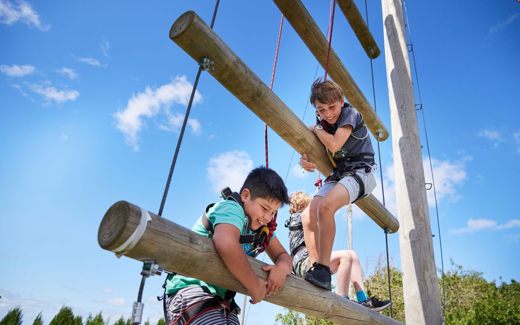 Two children climbing the Jacob's Ladder